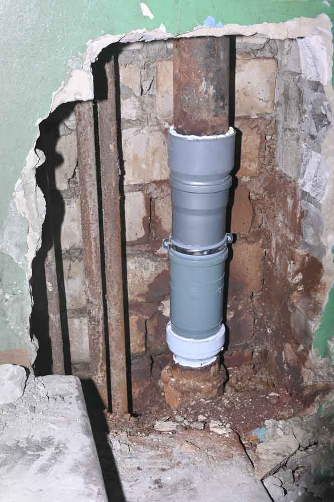 sewer repair, new pipe was connected to an old cast-iron pipe